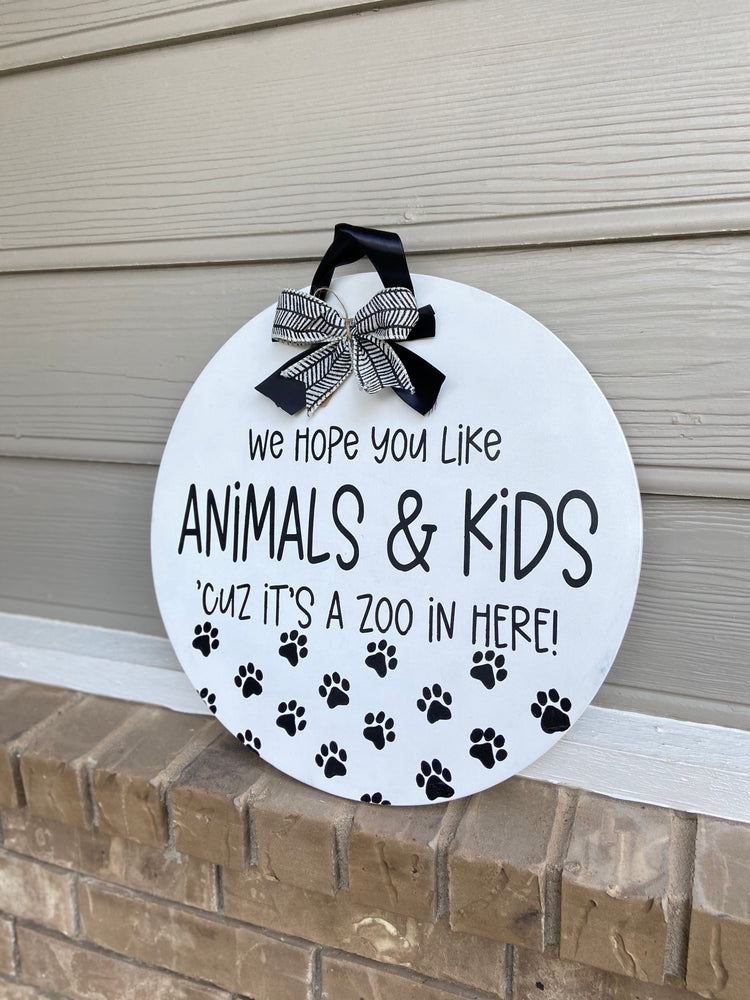 We hope you like animals and kids, ‘cuz it’s a zoo in here! - Door Round